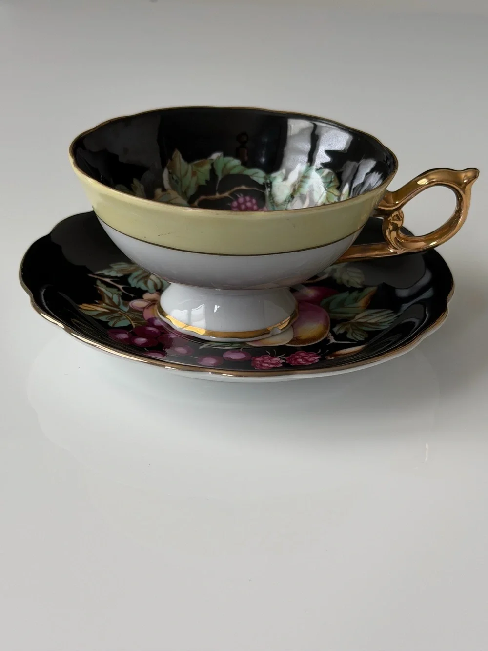 Japan Royal Sealy Vintage Porcelain Black & Gold Fruit Motif Teacup & Saucer Set